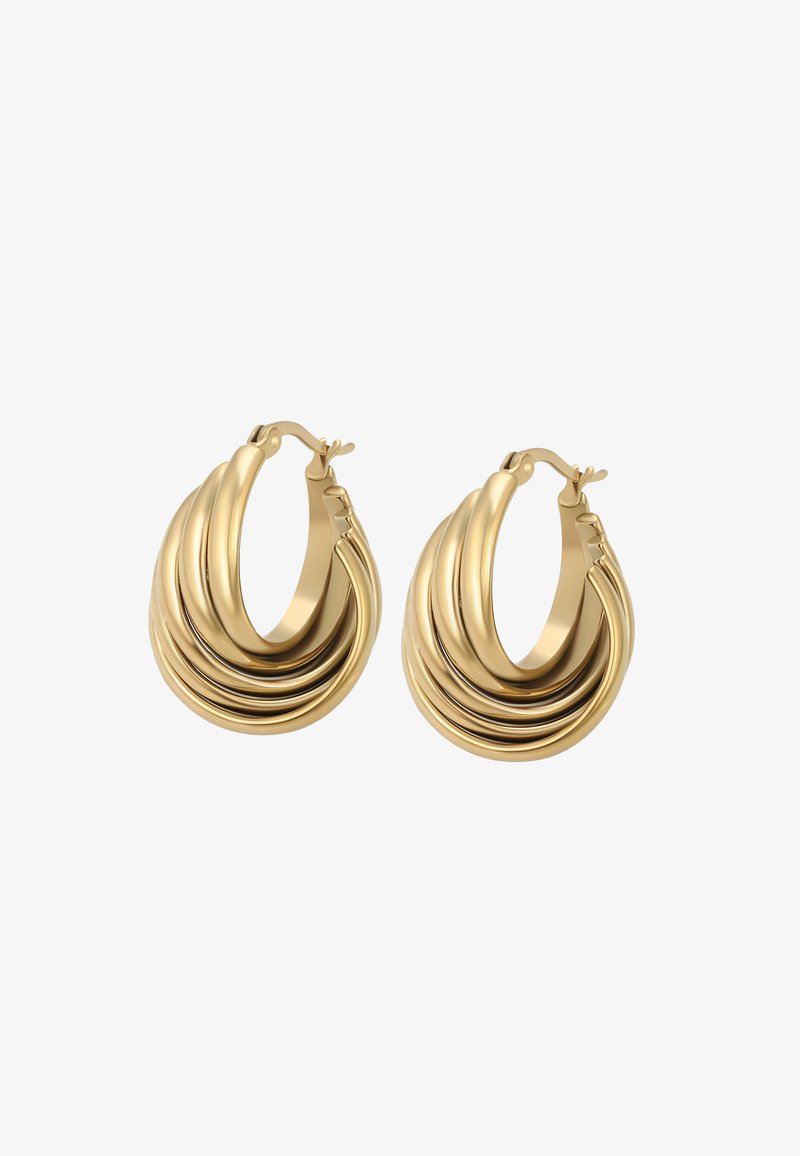 Boucles d'oreilles en or en forme de créoles avec un design superposé, comportant cinq anneaux concentriques. Surface lisse et polie avec un fermoir à charnière.