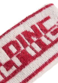 Piros és fehér kötött fejpánt, amelyen jól láthatóan az "ALPINE" felirat szerepel. Az anyaga puha, bolyhos tapintású.