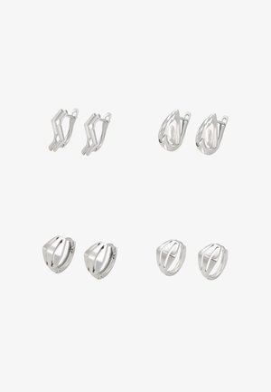 Sterling ezüst fülbevalók két stílusban: egyik szögletes, nyitott mintákkal, a másik lekerekített, rétegezett formákkal.