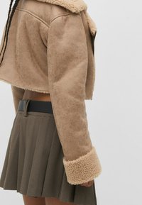 Stradivarius Bunda z umělé kůže - light brown