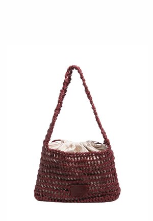 Maroon woven handbag with a braided strap and a white fabric drawstring pouch inside.
