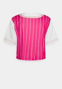 Pink short-sleeve top with vertical white stripes, contrasting white sleeves, and a round neckline, featuring a smooth, lightweight fabric.