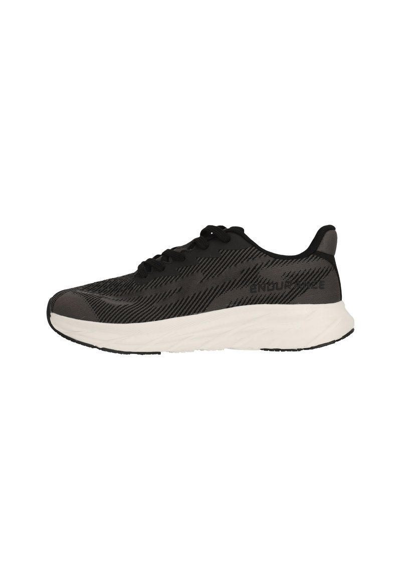 Zapatillas deportivas negras con un upper de tela texturizada, que presentan un diseño elegante, entresuela blanca y suela negra; estilo con cordones y patrones sutiles.
