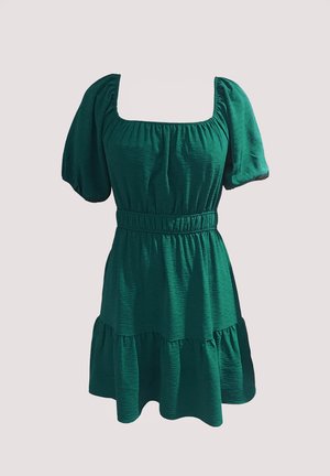 Vestito verde con maniche a sbuffo, scollatura quadrata, texture arricciata, vita elastica e design a strati della gonna. Tessuto leggero.