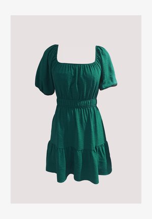 Vestito verde con maniche a sbuffo, scollatura quadrata, texture arricciata, vita elastica e design a strati della gonna. Tessuto leggero.