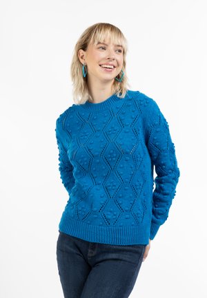 - Sweter