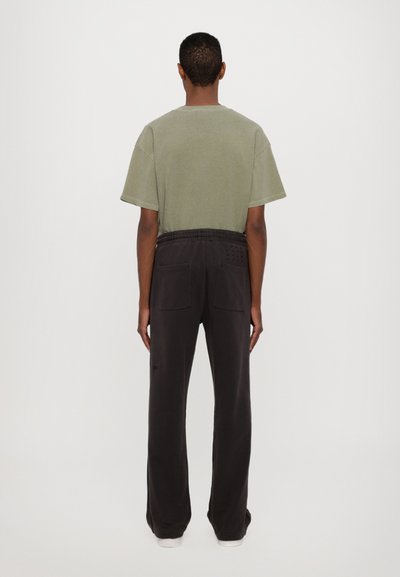 Ksubi INVERSED SYNTHESIS PANT FADED - Treniņtērpa apakšdaļas - black