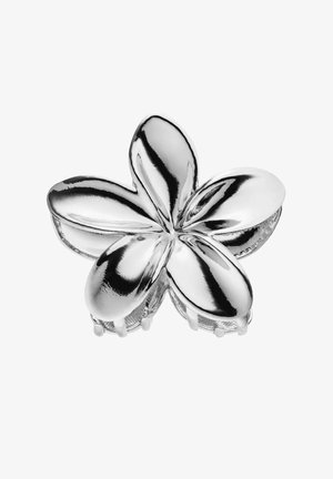 Glänzender silberner Haarclip in Form einer fünfblättrigen Blume mit abgerundeten Blütenblättern und kleinen Greifzähnen darunter.