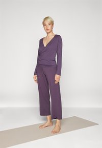 Yogasearcher RAVANA FLOWY PANTS - Donji dijelovi trenirke - topaze