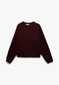 Sudadera burdeos de tejido suave, con cuello redondo, mangas raglán y puños y dobladillo acanalados, con un corte relajado.