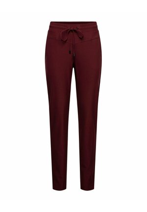 Karmozijnrode slim-fit broek met een elastische tailleband en vooraan een trekkoord op een witte achtergrond.