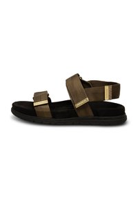 Brown fabric sandals with adjustable straps, textured design, black cushioned sole, and gold accents. Suitable for casual wear.