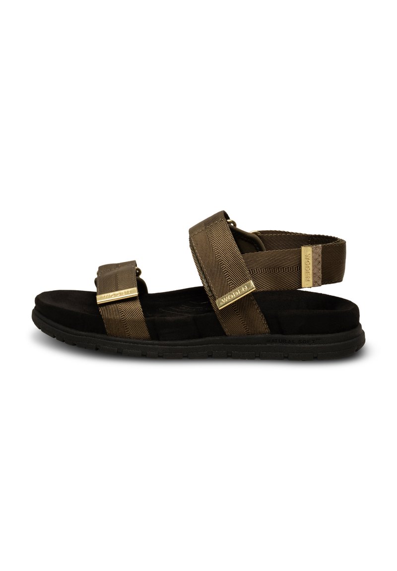 Brown fabric sandals with adjustable straps, textured design, black cushioned sole, and gold accents. Suitable for casual wear.