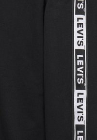 Levi's® RELAXED GRAPHIC CREWNECK SWEATSHIRT - Felpa -  caviar