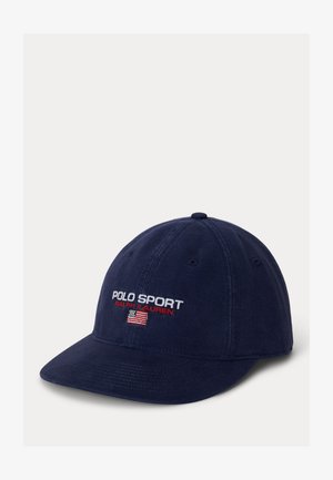 Navy blue baseball cap with "POLO SPORT RALPH LAUREN" embroidery and a small American flag on the front panel.