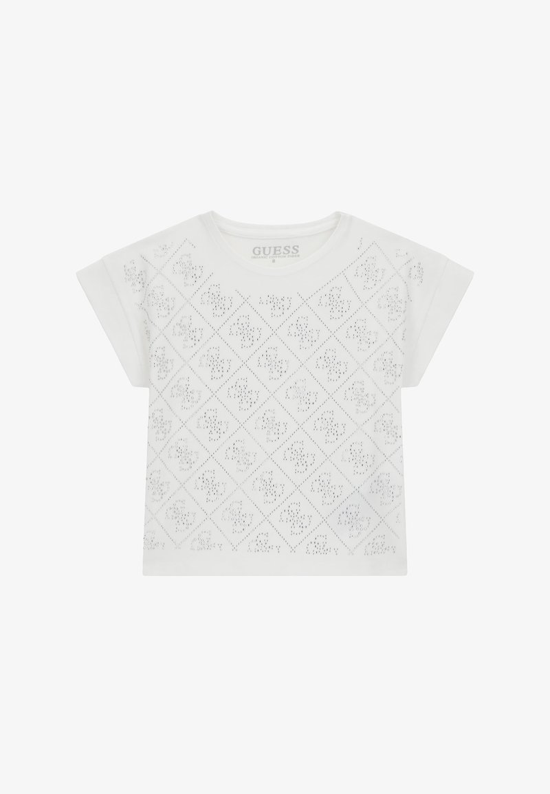 Bílá krátkosrstá tričko vyrobené z organické bavlny, s diamantovými perforacemi a kulatým výstřihem, se značkovou etiketou uvnitř.