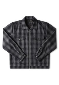Veste à carreaux grise avec zip à l'avant, deux poches poitrine et poignets à bouton. Fabriquée en tissu texturé, elle présente un design avec col.