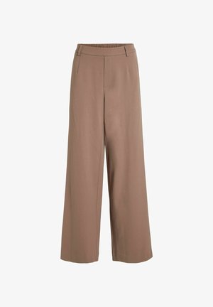 Platās kājas bikses no mīkstas, brūnas auduma. Iezīmes elastīga josta, plakana priekšpuse un tīras līnijas. Gluda tekstūra bez redzamām rakstām.