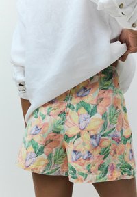 Next Minisukně - tropical print