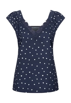 Mörkblå topp med vita hjärtmönster, V-ringning dekorerad med spets, korta puffärmar och mjuk tygstruktur.