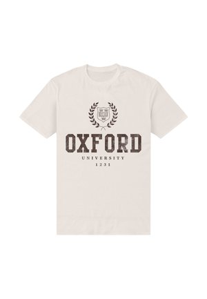 Beige kortærmet T-shirt med teksten "OXFORD UNIVERSITY 1231" og en laurbærkrans og skjoldemblem trykt i mørk brun på forsiden.
