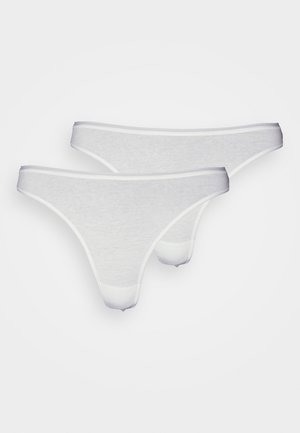 White cotton thong underwear, featuring a smooth texture, thin elastic waistband, and minimalistic design with a soft finish.