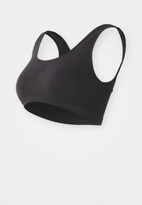 Črna brezšivna športna modrček z širokimi naramnicami in elastičnim pasom pod prsmi, zasnovan za udobje in podporo.