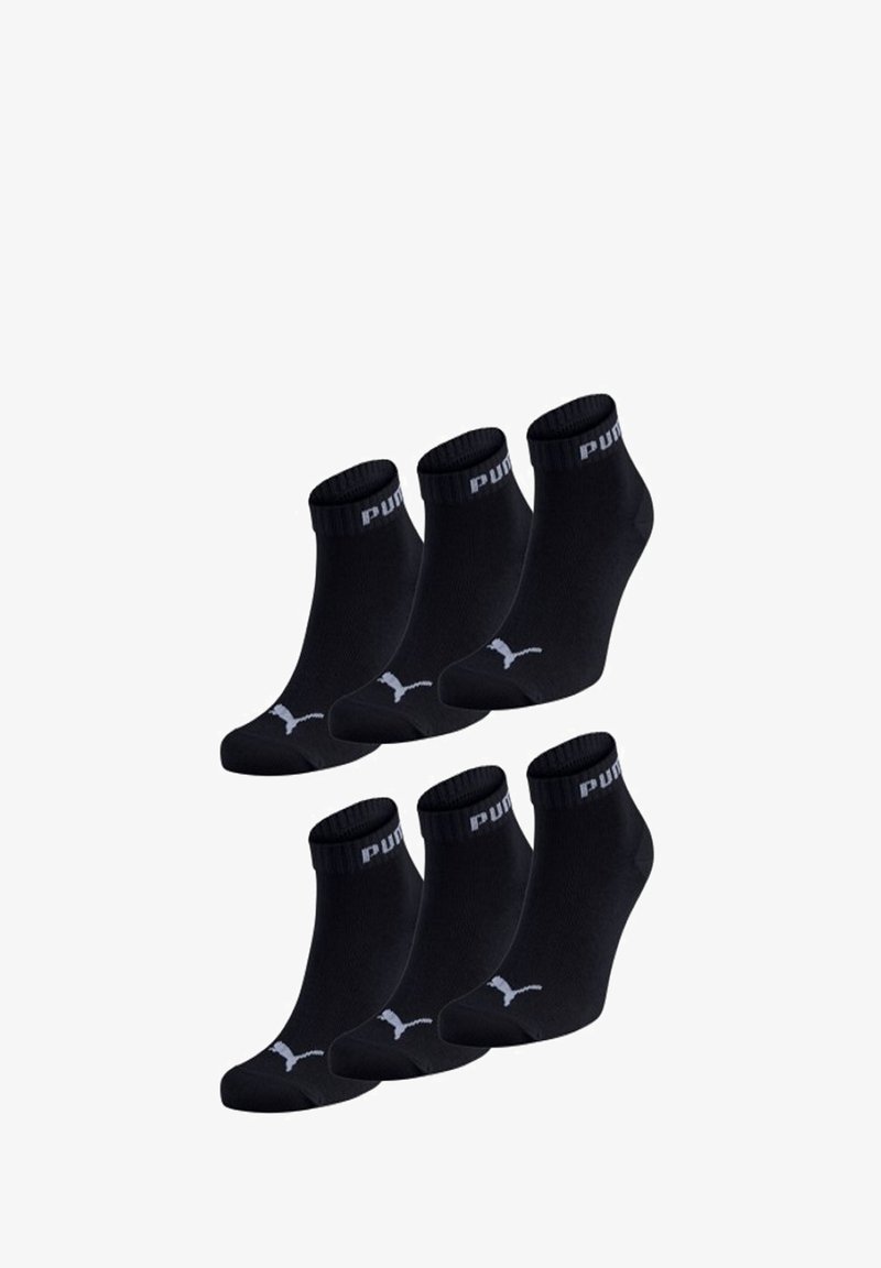 Black ankle socks made of cotton blend, featuring ribbed cuffs, a logo on the band, and a low-cut design. Pack of six pairs.