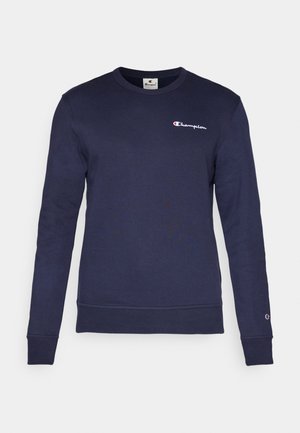 Sudadera de color azul marino confeccionada en mezcla de algodón, con mangas largas, cuello redondo, dobladillo acanalado y logo de Champion bordado en el pecho.