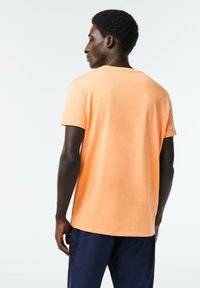 Lacoste T-shirt - bas - orange clair