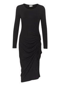 Crna haljina dugih rukava s okruglim izrezom, sa naglašenim naborima sa jedne strane i drapiranim rubom za elegantnu siluetu.