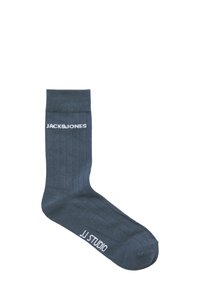 Donkerblauwe geribde sok met een wit logo "JACK&JONES" aan de zijkant, met een naadloze teenconstructie en een contrasterend wit "JJ STUDIO" aan de onderkant.