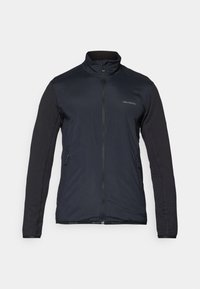 Veste noire zippée avec des manches longues texturées, col montant, deux poches latérales zippées et petit logo Salomon sur la poitrine.