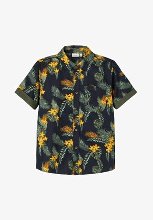 Chemise bleu marine à manches courtes avec boutons sur le devant, poignets verts et motif tropical de fleurs jaunes et de feuilles de palmier vertes.