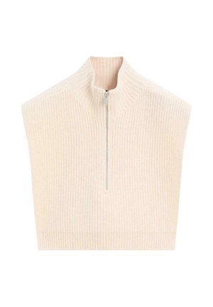 Un gilet en maille côtelée de couleur crème avec une fermeture éclair mi-haute à l'avant et un col haut, présenté à plat sur un fond blanc.