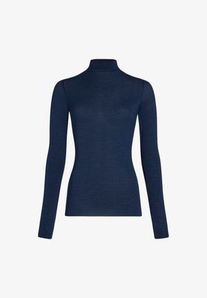 Marineblauwe langjarige turtleneck top gemaakt van lichtgewicht stof; aansluitend ontwerp met een gladde textuur; minimale zichtbare naden.