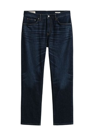 Mørkeblå jeans med lige ben, front- og baglommer, knaplukning og subtile slidmærker på lårene.