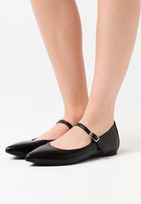 Unisa Bailarinas con hebilla - black