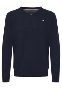 Mørkeblå v-hals genser i et mykt strikket stoff, med lange ermer og et lite brodert logo på venstre bryst.