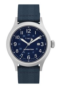 El reloj de pulsera Timex Expedition cuenta con una caja redonda en tono plata, una correa texturizada azul marino, una esfera azul con marcadores de hora blancos y una visualización de la fecha.