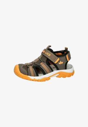 Child’s brown and orange closed-toe sandal with adjustable Velcro strap and breathable mesh upper on rugged sole.