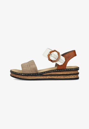 Brown suede and white leather sandal with an octagonal buckle, cork midsole, and black rubber outsole, featuring layered design details.