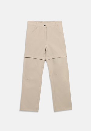 Beige bukser med avtagbare ben som kan tas av med glidelås, og forvandler dem til shorts, med knapp og beltehemper i livet.