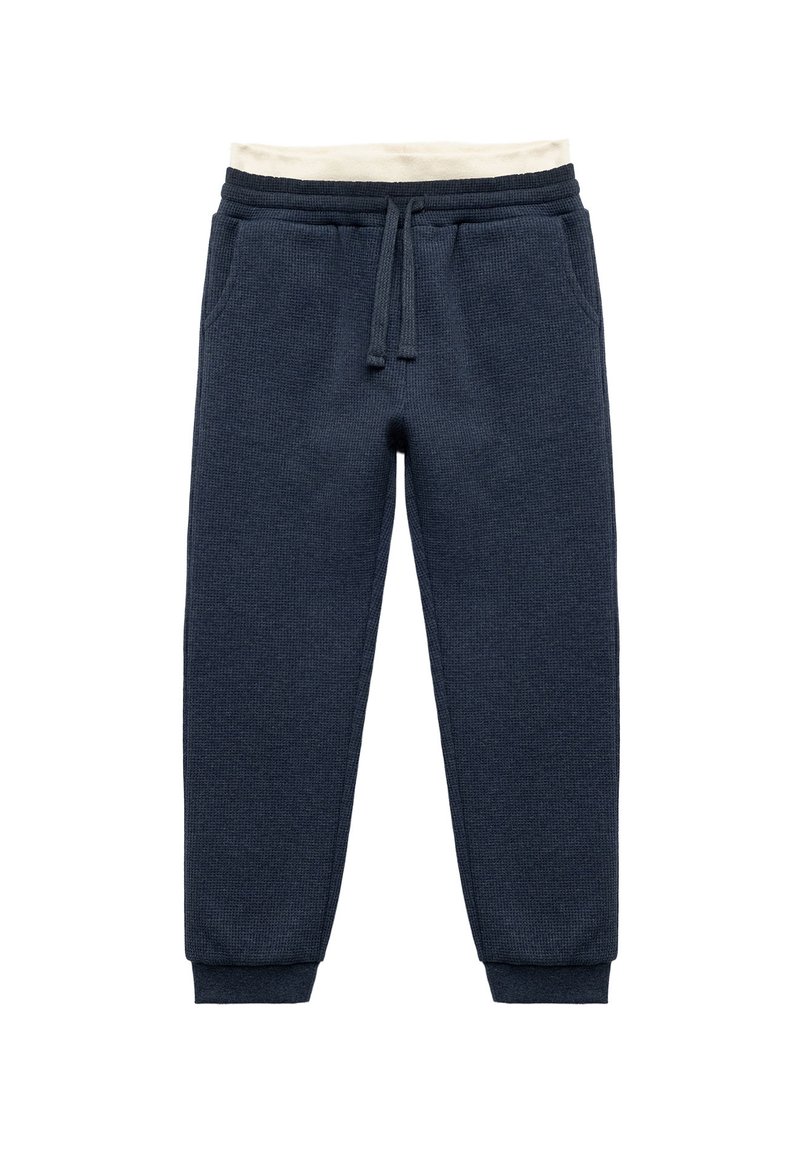 Marineblaue Jogginghosen aus einem strukturierten Stoff, mit elastischem Bund, verstellbarem Kordelzug und schmal zulaufenden Bündchen. Seitentaschen vorhanden.