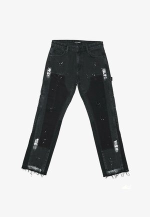 Svarta denimbyxor med slitna lappar, fransade fållar och strukturerade detaljer. Midje med medelhög höjd och en standard femfickorsdesign.