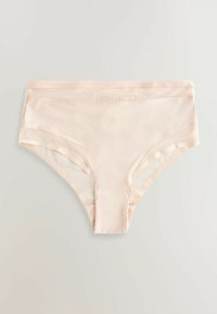 Sous-vêtement féminin taille haute beige clair sans couture avec une finition en tissu lisse, posé à plat sur un fond clair.