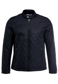 Sort quiltet jakke med opretstående krave, lange ærmer og en frontlynlås. Har sidelommer og en glat, blank finish.