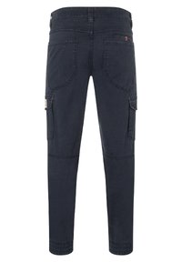 Dark blue cargo pants made of durable fabric, featuring back pockets, side pockets, and a tapered leg design with stitched details.