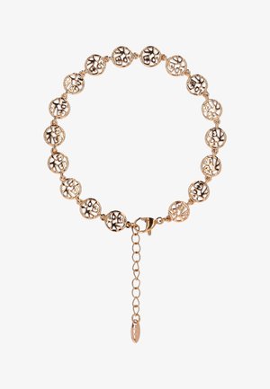 Bransoletka w kolorze złotym z połączonymi okrągłymi zawieszkami o misternych wycięciach oraz zapięciem w formie karabińczyka z regulowanym łańcuszkiem.