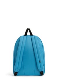 Zaino in tessuto blu con forma arrotondata, spallacci imbottiti e manico superiore nero. Include tasche laterali e una superficie testurizzata.